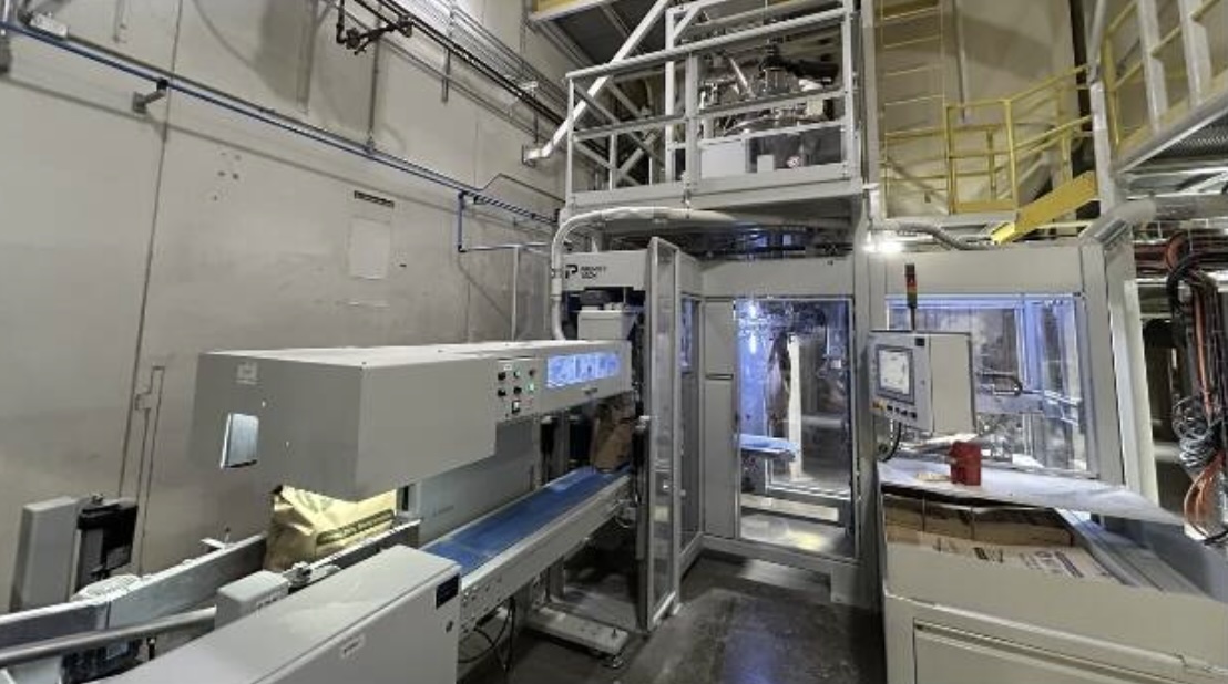 Automated palletizing equipment inside the Iowa Corn Processors facility